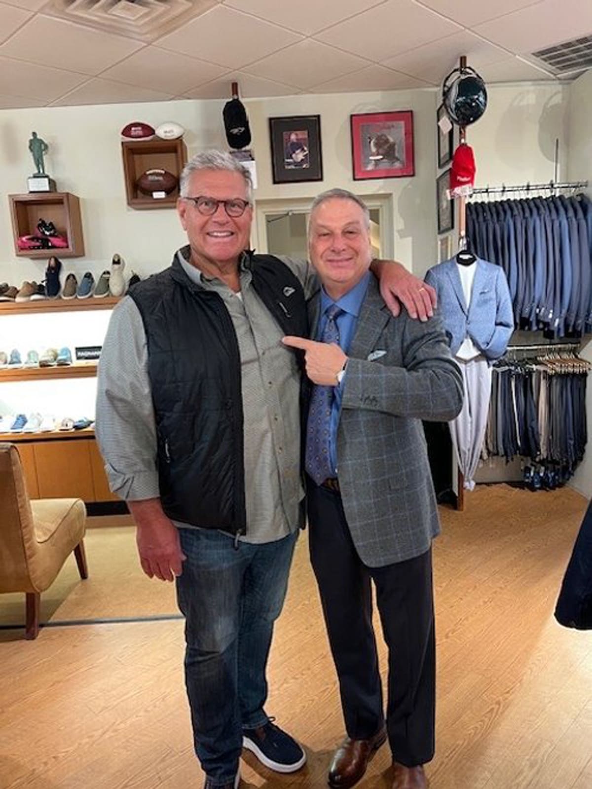 Jeff Stoutland with a member of the Ventresca Ltd. team, inside the store